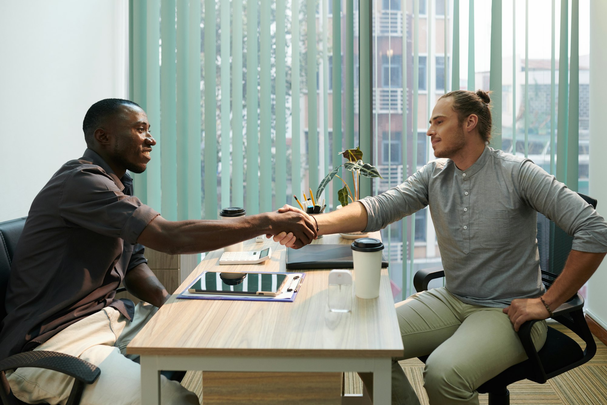 Recruiter Shaking Hand of Candidate